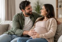 Expectant father supporting his pregnant partner at home